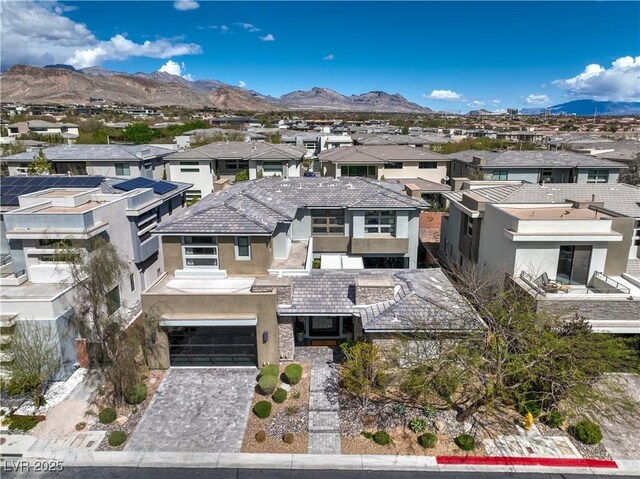 10 Sugarberry Ln, Las Vegas, NV 89135 - aerial perspective of suburban area featuring a mountainous background