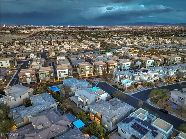 10 Sugarberry Ln, Las Vegas, NV 89135 - aerial perspective of suburban area with a mountainous background
