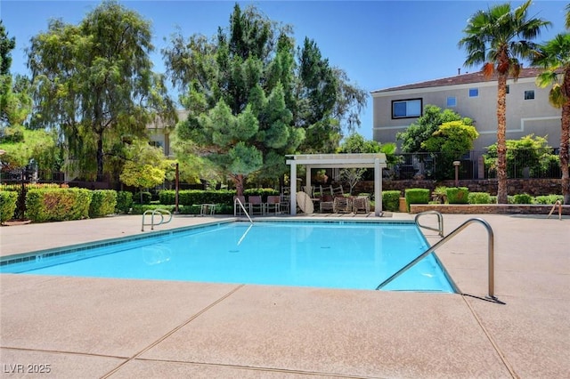 9303 Gilcrease Ave Unit 2217, Las Vegas, NV 89149 - community pool featuring a pergola and a patio area