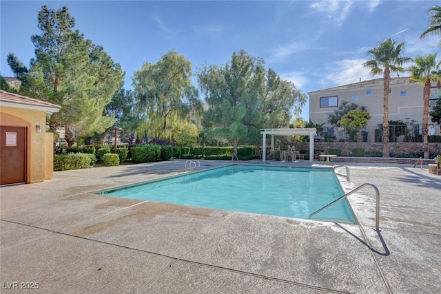 9303 Gilcrease Ave Unit 2217, Las Vegas, NV 89149 - community pool featuring a pergola and a patio