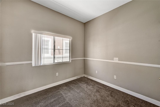 9303 Gilcrease Ave Unit 2217, Las Vegas, NV 89149 - empty room with dark colored carpet and baseboards