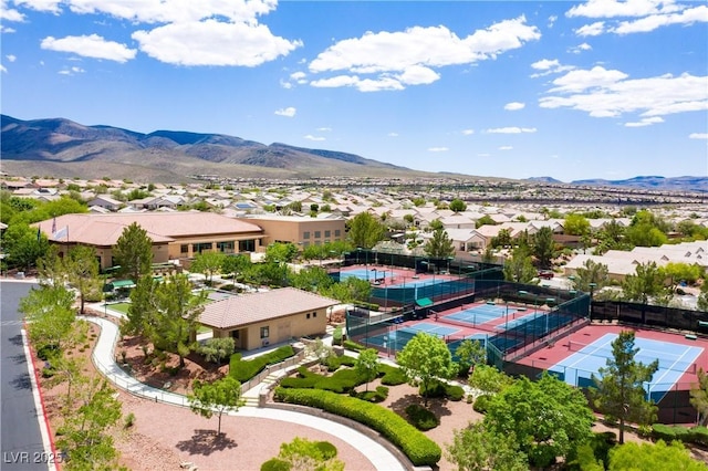 2467 Moonlight Valley Ave, Henderson, NV 89044 - aerial perspective of suburban area with a mountainous background