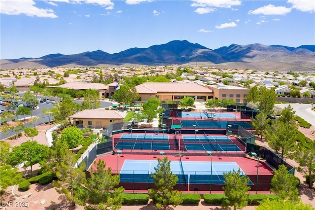 2467 Moonlight Valley Ave, Henderson, NV 89044 - aerial perspective of suburban area with a mountain backdrop