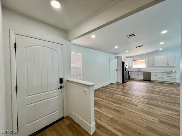 6191 Bullion Blvd, Las Vegas, NV 89103 - foyer with light wood-type flooring, recessed lighting, and baseboards