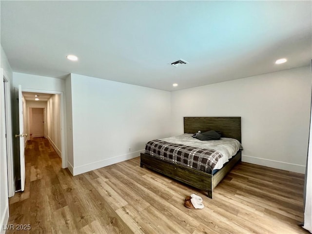 6191 Bullion Blvd, Las Vegas, NV 89103 - bedroom with baseboards, wood finished floors, and recessed lighting