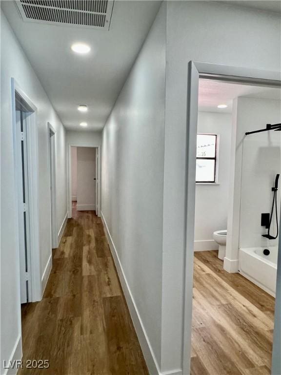 6191 Bullion Blvd, Las Vegas, NV 89103 - hallway featuring wood finished floors and baseboards