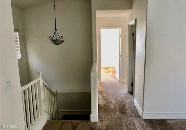 224 Wicked Wedge Way, Las Vegas, NV 89148 - hallway featuring an upstairs landing, carpet floors, healthy amount of natural light, and baseboards