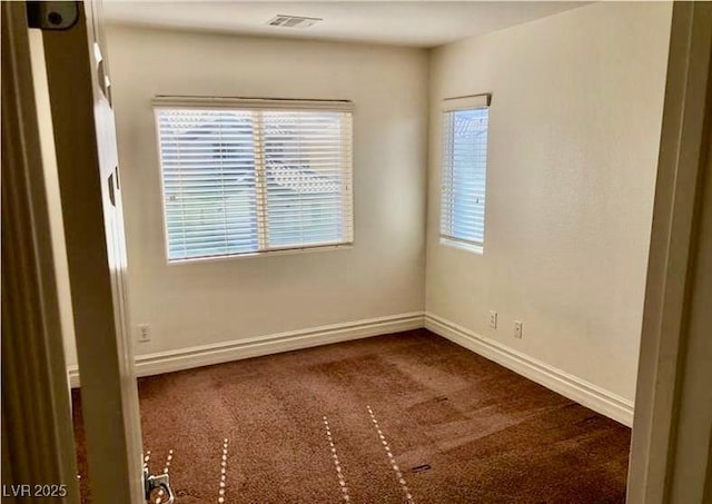 224 Wicked Wedge Way, Las Vegas, NV 89148 - spare room with dark carpet and baseboards