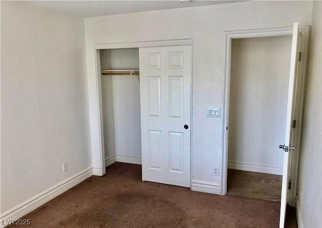 224 Wicked Wedge Way, Las Vegas, NV 89148 - unfurnished bedroom with dark colored carpet, a closet, and baseboards