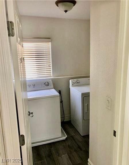 224 Wicked Wedge Way, Las Vegas, NV 89148 - laundry area featuring washer and dryer and dark wood finished floors