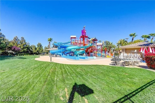 224 Wicked Wedge Way, Las Vegas, NV 89148 - community jungle gym featuring a lawn