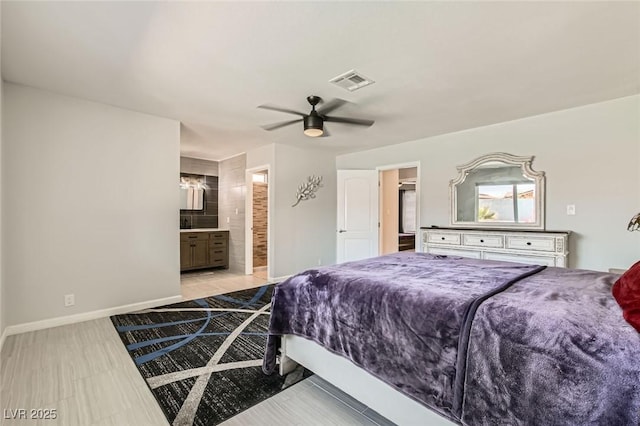 6309 Miraloma St, Las Vegas, NV 89108 - bedroom with connected bathroom, baseboards, and ceiling fan