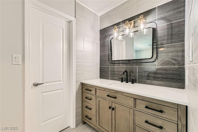 6309 Miraloma St, Las Vegas, NV 89108 - bathroom featuring vanity, tasteful backsplash, a chandelier, and tile walls