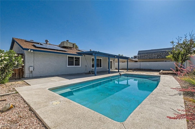 6309 Miraloma St, Las Vegas, NV 89108 - view of swimming pool with a patio, a fenced backyard, and central AC
