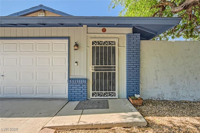 6309 Miraloma St, Las Vegas, NV 89108 - property entrance featuring brick siding and a garage