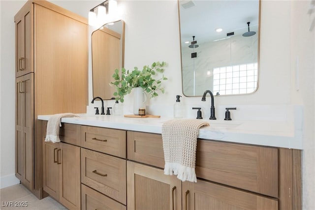 8140 Bay Harbor Dr, Las Vegas, NV 89128 - bathroom featuring double vanity, walk in shower, and tile patterned flooring