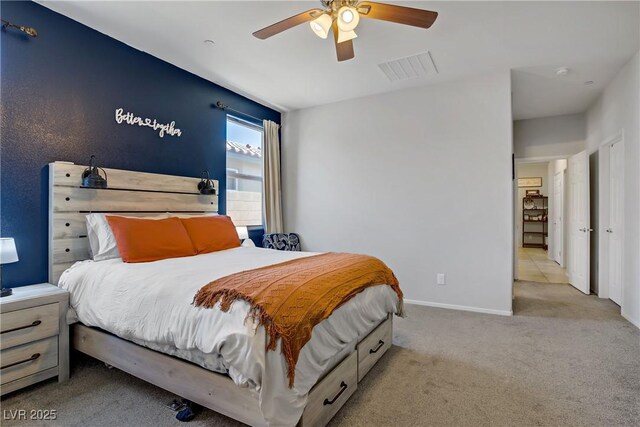 2169 Rio Rancho Pointe Pl, Henderson, NV 89002 - bedroom with carpet floors, baseboards, and ceiling fan