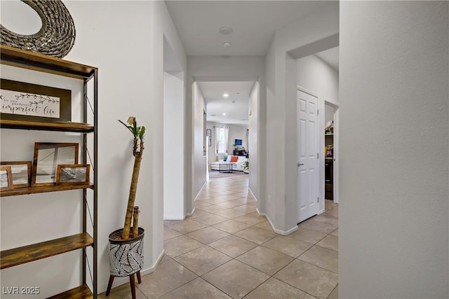 2169 Rio Rancho Pointe Pl, Henderson, NV 89002 - corridor with light tile patterned flooring, recessed lighting, and baseboards