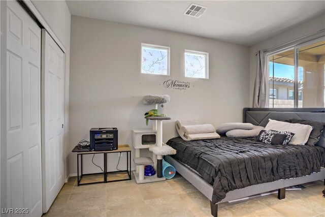 2169 Rio Rancho Pointe Pl, Henderson, NV 89002 - bedroom featuring multiple windows and a closet