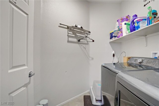 2169 Rio Rancho Pointe Pl, Henderson, NV 89002 - laundry room featuring separate washer and dryer, baseboards, and light tile patterned flooring