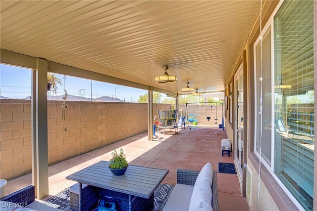 2169 Rio Rancho Pointe Pl, Henderson, NV 89002 - fenced backyard with a patio and outdoor lounge area