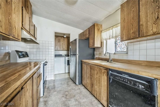 960 Third St, Pahrump, NV 89048 - kitchen with dishwasher, electric stove, a sink, washing machine and clothes dryer, and freestanding refrigerator
