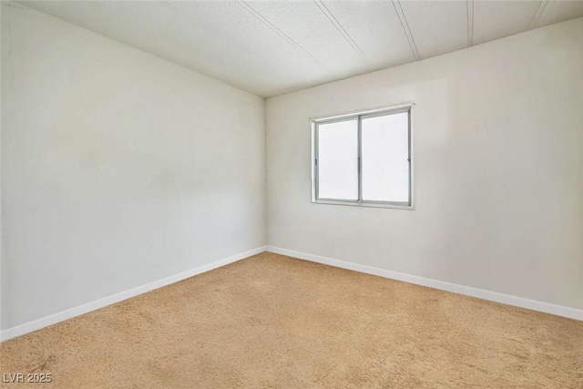 960 Third St, Pahrump, NV 89048 - carpeted spare room featuring baseboards