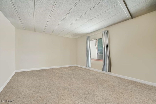 960 Third St, Pahrump, NV 89048 - carpeted empty room with a textured ceiling and baseboards