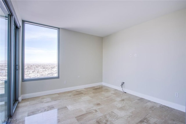 222 Karen Ave Unit 2308, Las Vegas, NV 89109 - spare room featuring baseboards