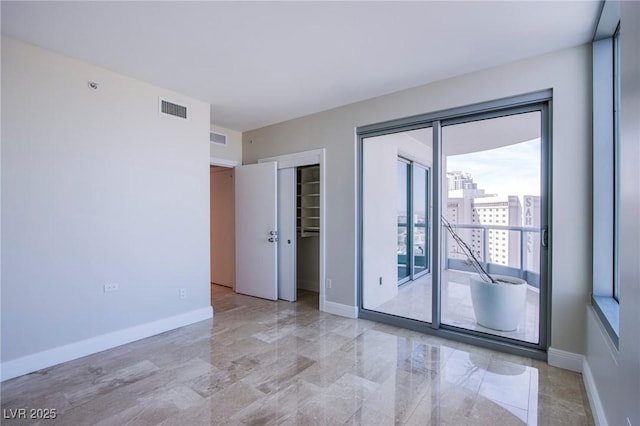 222 Karen Ave Unit 2308, Las Vegas, NV 89109 - spare room featuring baseboards