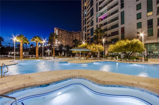 222 Karen Ave Unit 2308, Las Vegas, NV 89109 - pool at twilight with a community pool