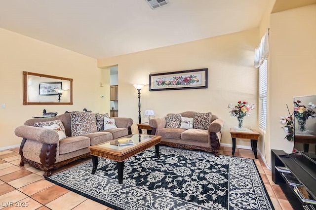 8777 Shady Peak Way, Las Vegas, NV 89123 - living room featuring light tile patterned floors and baseboards