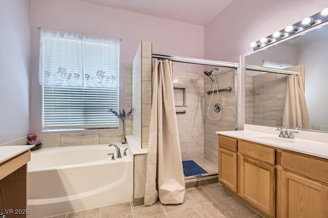 8777 Shady Peak Way, Las Vegas, NV 89123 - bathroom featuring vanity, a stall shower, and a garden tub
