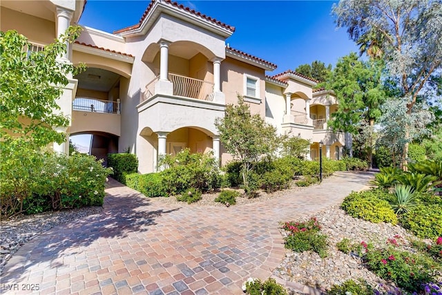 12 Strada Di Circolo -, Unit Henderson, NV 89011 - view of front of property featuring stucco siding and a tiled roof