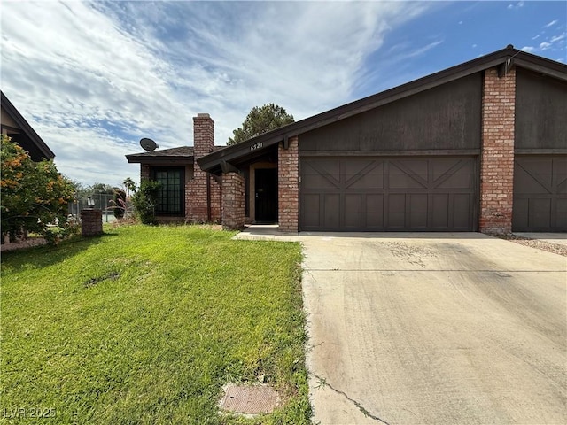 6521 Sugarpine Ln, Las Vegas, NV 89107 - mid-century home with driveway, a chimney, an attached garage, a front yard, and brick siding