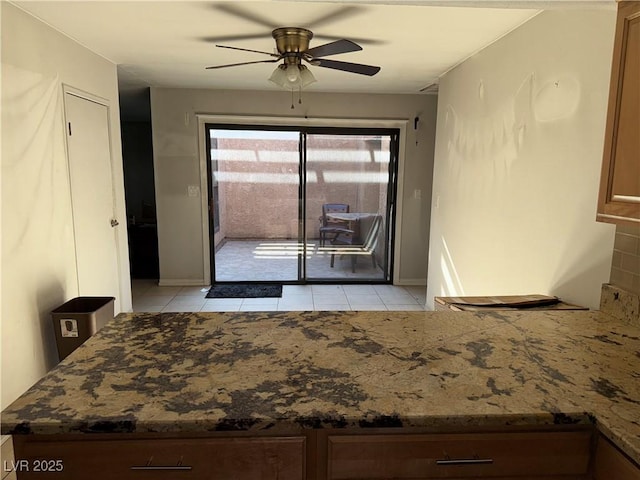 6521 Sugarpine Ln, Las Vegas, NV 89107 - detailed view of a ceiling fan and baseboards