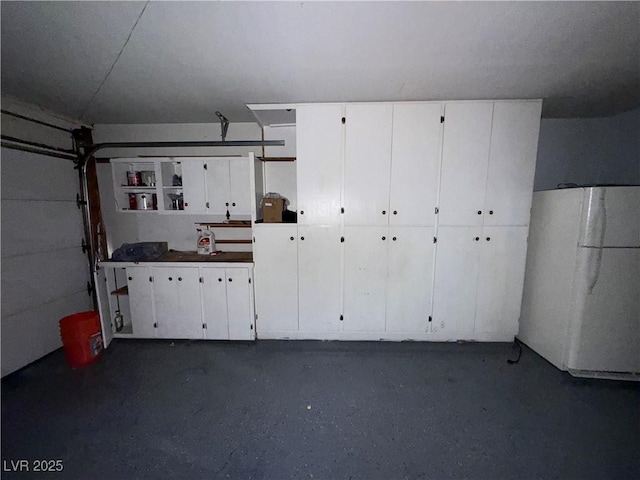 6521 Sugarpine Ln, Las Vegas, NV 89107 - garage with freestanding refrigerator