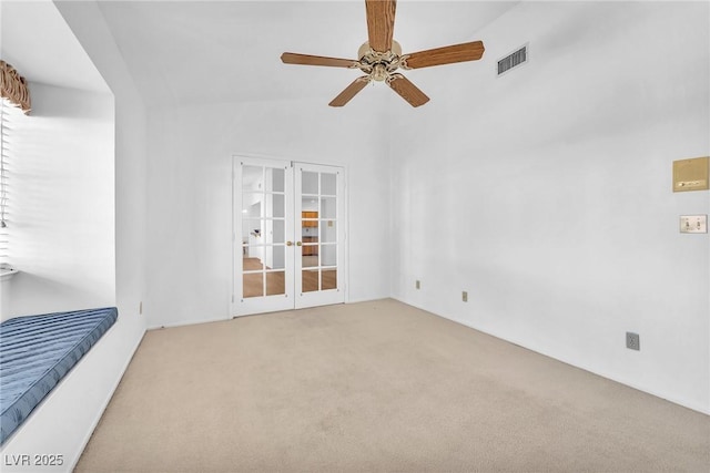 1951 Moyer Dr, Henderson, NV 89074 - empty room featuring carpet flooring, a ceiling fan, french doors, and lofted ceiling