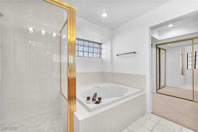 1951 Moyer Dr, Henderson, NV 89074 - bathroom with a shower stall, a garden tub, tile patterned floors, healthy amount of natural light, and recessed lighting