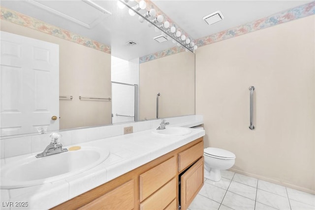 1951 Moyer Dr, Henderson, NV 89074 - bathroom featuring double vanity, toilet, a shower, and tile patterned flooring