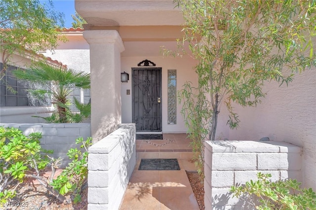 1951 Moyer Dr, Henderson, NV 89074 - property entrance with covered porch and stucco siding