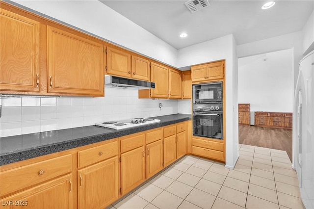 1951 Moyer Dr, Henderson, NV 89074 - kitchen featuring black appliances, under cabinet range hood, dark countertops, backsplash, and recessed lighting