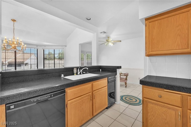 1951 Moyer Dr, Henderson, NV 89074 - kitchen featuring black dishwasher, a sink, dark countertops, a ceiling fan, and lofted ceiling