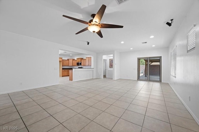 4062 Vulcan St, Las Vegas, NV 89122 - unfurnished living room with a ceiling fan, light tile patterned floors, and recessed lighting