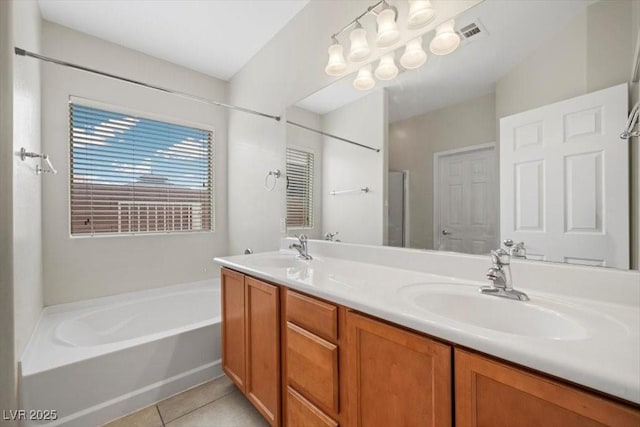 4062 Vulcan St, Las Vegas, NV 89122 - full bathroom with a bath, double vanity, and tile patterned floors