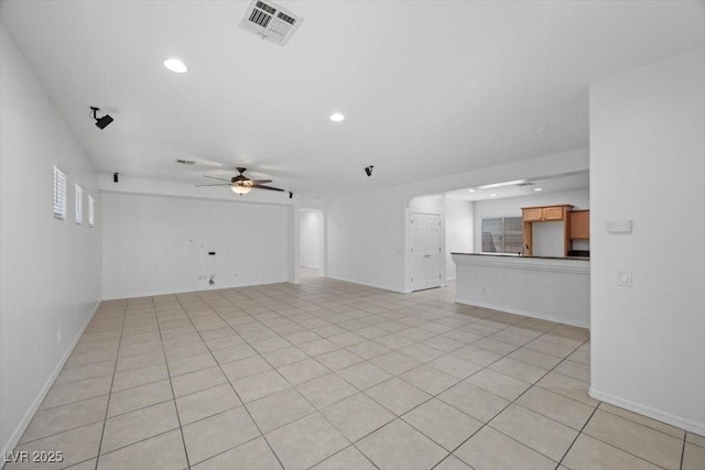 4062 Vulcan St, Las Vegas, NV 89122 - unfurnished living room with ceiling fan, recessed lighting, and light tile patterned floors