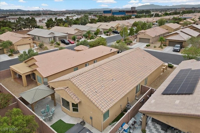 4062 Vulcan St, Las Vegas, NV 89122 - aerial view of residential area featuring a mountain backdrop