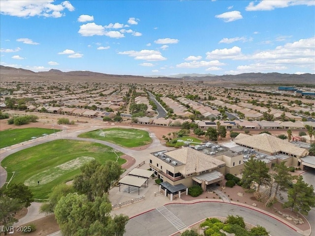 4062 Vulcan St, Las Vegas, NV 89122 - aerial view of residential area with a mountainous background and a golf club