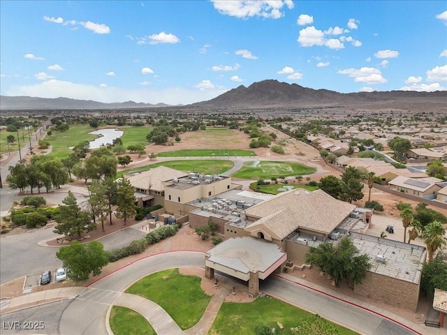 4062 Vulcan St, Las Vegas, NV 89122 - aerial perspective of suburban area with a golf course and a water and mountain view