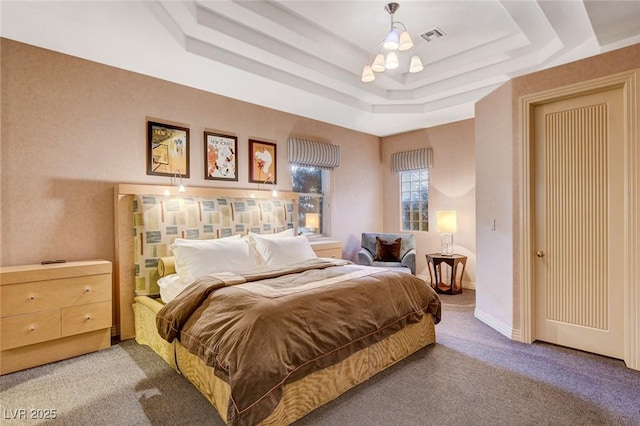 60 Innisbrook Ave, Las Vegas, NV 89113 - bedroom featuring a tray ceiling and carpet floors